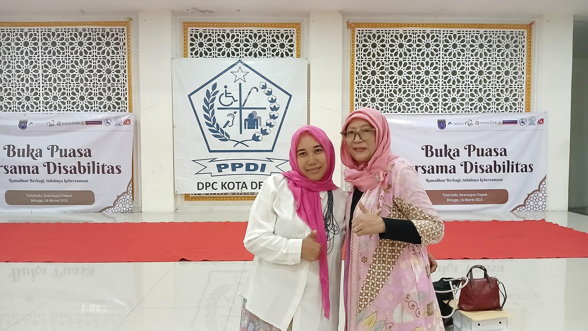 Natalia Ketua PPDI Depok bersama Yenny Ketua SWI Depok